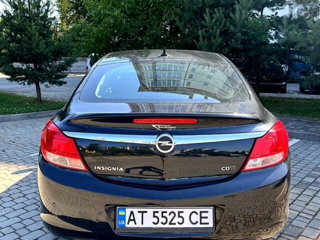 Чорний Опель Інсігнія, об'ємом двигуна 2 л та пробігом 312 тис. км за 7800 $, фото 2 на Automoto.ua
