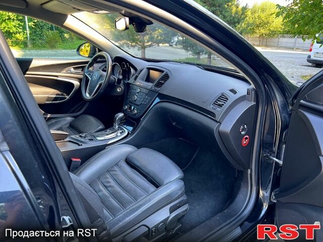 Чорний Опель Інсігнія, об'ємом двигуна 2 л та пробігом 312 тис. км за 7800 $, фото 5 на Automoto.ua