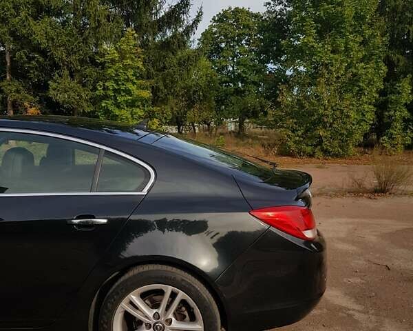 Черный Опель Инсигния, объемом двигателя 1.96 л и пробегом 347 тыс. км за 8300 $, фото 12 на Automoto.ua