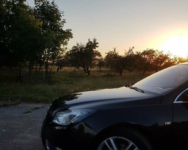 Черный Опель Инсигния, объемом двигателя 1.96 л и пробегом 347 тыс. км за 8300 $, фото 4 на Automoto.ua