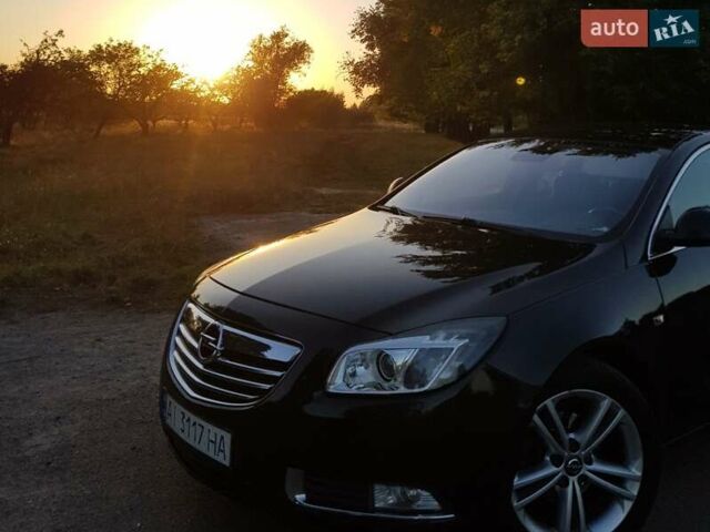 Черный Опель Инсигния, объемом двигателя 1.96 л и пробегом 347 тыс. км за 8300 $, фото 1 на Automoto.ua