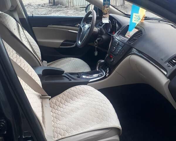 Черный Опель Инсигния, объемом двигателя 1.96 л и пробегом 380 тыс. км за 7500 $, фото 4 на Automoto.ua