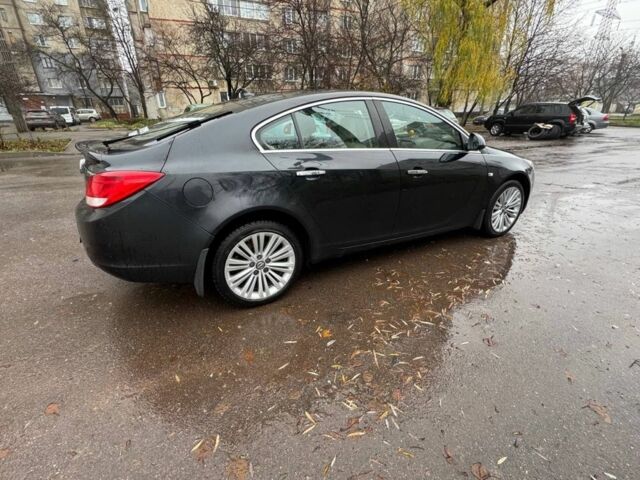 Черный Опель Инсигния, объемом двигателя 2 л и пробегом 266 тыс. км за 7700 $, фото 1 на Automoto.ua