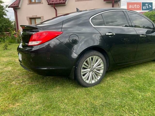 Чорний Опель Інсігнія, об'ємом двигуна 2 л та пробігом 220 тис. км за 10200 $, фото 4 на Automoto.ua