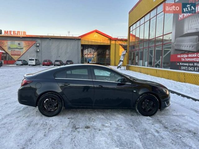 Черный Опель Инсигния, объемом двигателя 1.96 л и пробегом 196 тыс. км за 10999 $, фото 1 на Automoto.ua