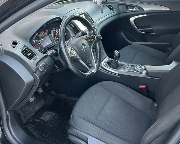 Черный Опель Инсигния, объемом двигателя 1.96 л и пробегом 196 тыс. км за 10999 $, фото 7 на Automoto.ua