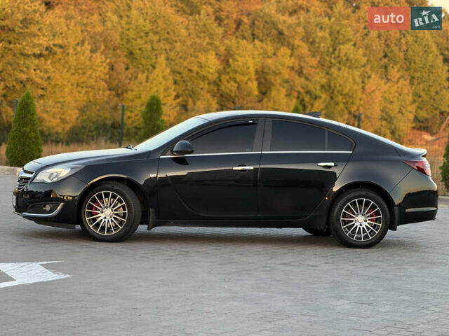 Чорний Опель Інсігнія, об'ємом двигуна 1.96 л та пробігом 260 тис. км за 11000 $, фото 2 на Automoto.ua