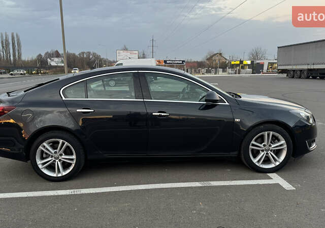 Черный Опель Инсигния, объемом двигателя 1.96 л и пробегом 179 тыс. км за 11900 $, фото 4 на Automoto.ua