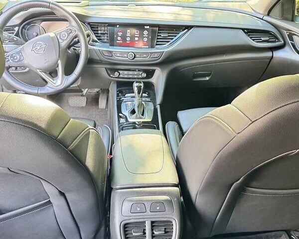 Черный Опель Инсигния, объемом двигателя 1.96 л и пробегом 118 тыс. км за 19900 $, фото 5 на Automoto.ua