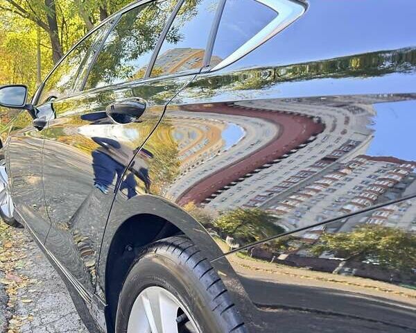 Черный Опель Инсигния, объемом двигателя 1.96 л и пробегом 118 тыс. км за 19900 $, фото 2 на Automoto.ua