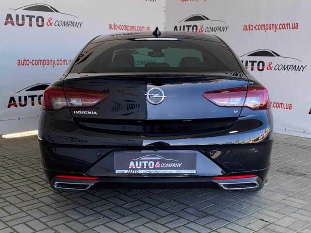 Черный Опель Инсигния, объемом двигателя 2 л и пробегом 140 тыс. км за 19950 $, фото 3 на Automoto.ua