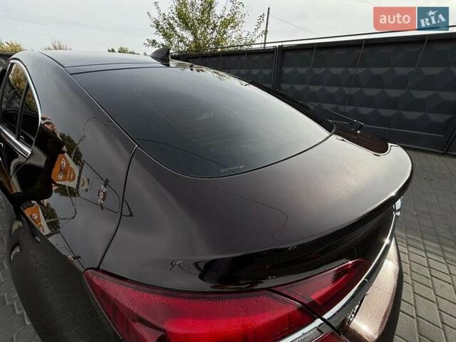 Коричневый Опель Инсигния, объемом двигателя 2 л и пробегом 140 тыс. км за 13800 $, фото 14 на Automoto.ua