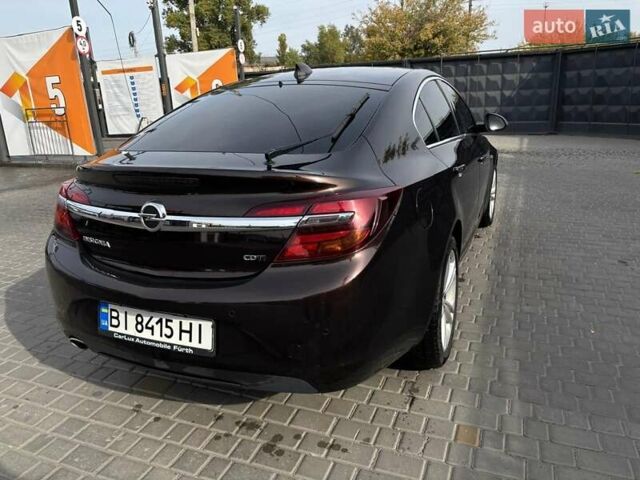 Коричневый Опель Инсигния, объемом двигателя 2 л и пробегом 140 тыс. км за 13800 $, фото 4 на Automoto.ua