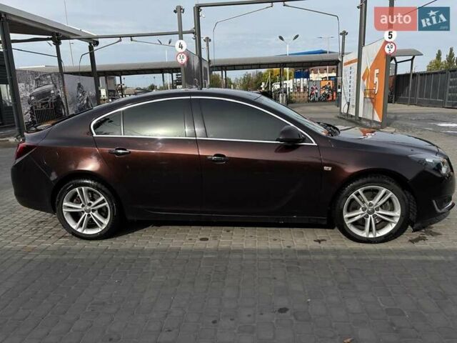 Коричневый Опель Инсигния, объемом двигателя 2 л и пробегом 140 тыс. км за 13800 $, фото 5 на Automoto.ua