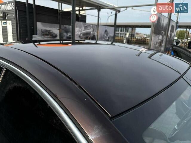 Коричневый Опель Инсигния, объемом двигателя 2 л и пробегом 140 тыс. км за 13800 $, фото 13 на Automoto.ua