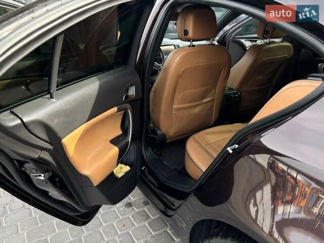 Коричневый Опель Инсигния, объемом двигателя 2 л и пробегом 140 тыс. км за 13800 $, фото 27 на Automoto.ua