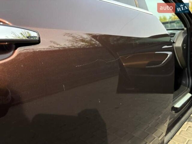 Коричневый Опель Инсигния, объемом двигателя 2 л и пробегом 140 тыс. км за 13800 $, фото 10 на Automoto.ua