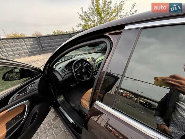 Коричневый Опель Инсигния, объемом двигателя 2 л и пробегом 140 тыс. км за 13800 $, фото 18 на Automoto.ua