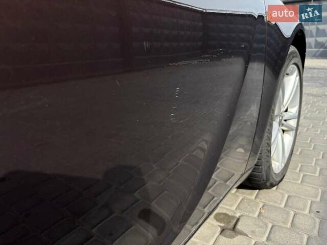 Коричневый Опель Инсигния, объемом двигателя 2 л и пробегом 140 тыс. км за 13800 $, фото 11 на Automoto.ua