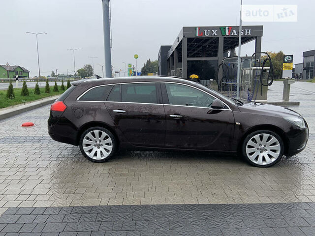 Коричневый Опель Инсигния, объемом двигателя 2 л и пробегом 260 тыс. км за 8999 $, фото 6 на Automoto.ua