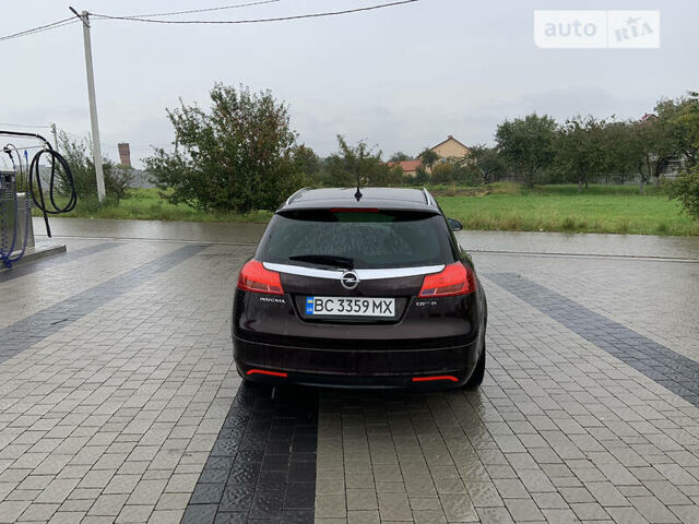 Коричневый Опель Инсигния, объемом двигателя 2 л и пробегом 260 тыс. км за 8999 $, фото 9 на Automoto.ua