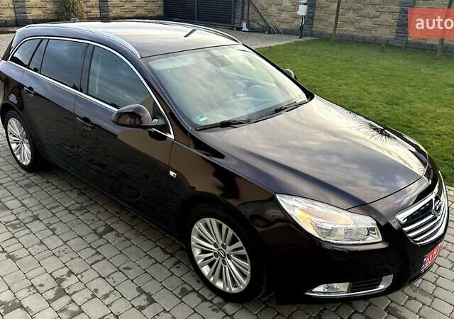 Коричневый Опель Инсигния, объемом двигателя 1.6 л и пробегом 187 тыс. км за 8550 $, фото 2 на Automoto.ua