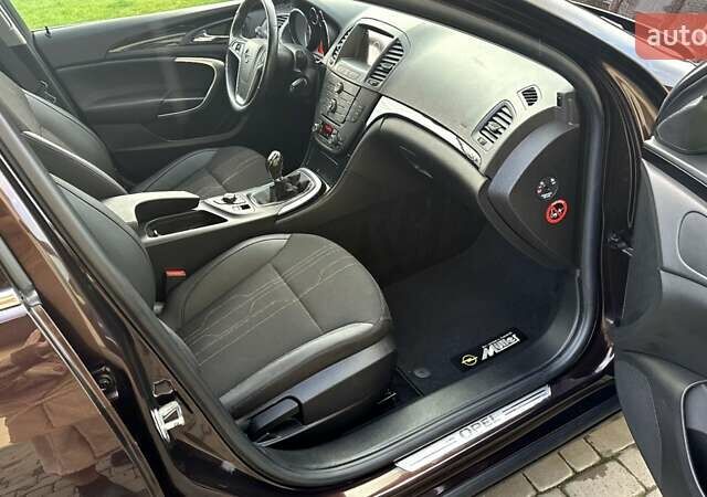 Коричневый Опель Инсигния, объемом двигателя 1.6 л и пробегом 187 тыс. км за 8550 $, фото 34 на Automoto.ua