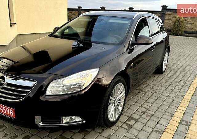 Коричневый Опель Инсигния, объемом двигателя 1.6 л и пробегом 187 тыс. км за 8550 $, фото 4 на Automoto.ua