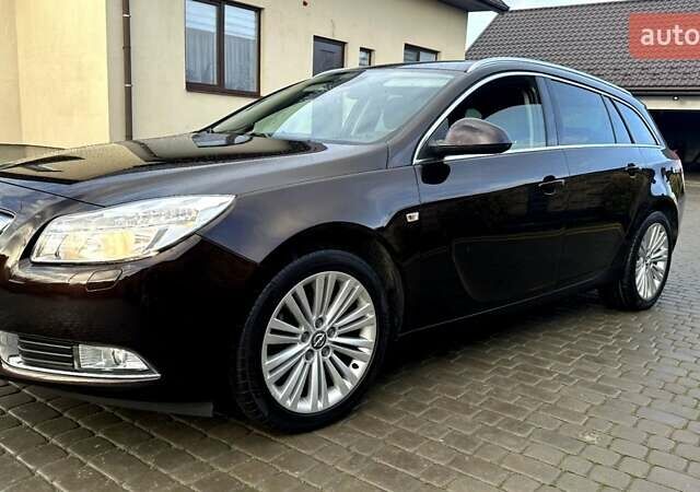 Коричневый Опель Инсигния, объемом двигателя 1.6 л и пробегом 187 тыс. км за 8550 $, фото 5 на Automoto.ua