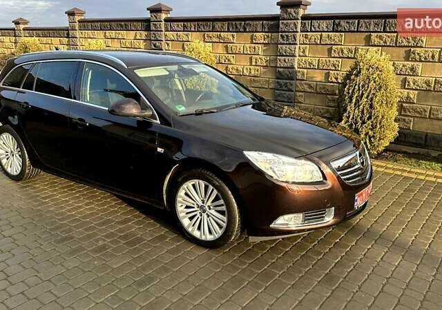 Коричневый Опель Инсигния, объемом двигателя 1.6 л и пробегом 187 тыс. км за 8550 $, фото 6 на Automoto.ua