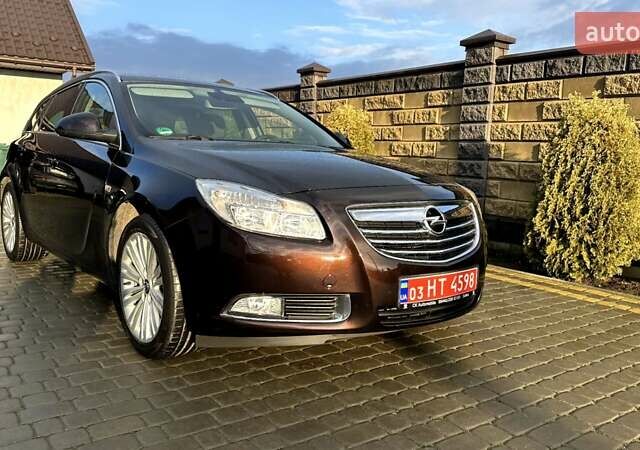 Коричневый Опель Инсигния, объемом двигателя 1.6 л и пробегом 187 тыс. км за 8550 $, фото 7 на Automoto.ua