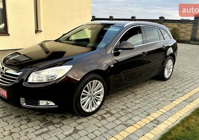 Коричневый Опель Инсигния, объемом двигателя 1.6 л и пробегом 187 тыс. км за 8550 $, фото 1 на Automoto.ua