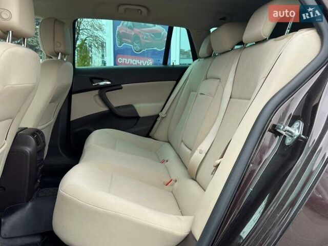 Коричневый Опель Инсигния, объемом двигателя 1.96 л и пробегом 198 тыс. км за 9700 $, фото 15 на Automoto.ua