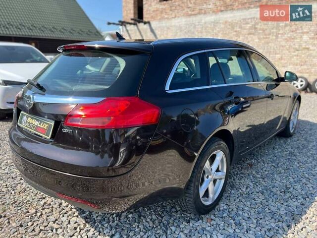 Коричневый Опель Инсигния, объемом двигателя 1.96 л и пробегом 321 тыс. км за 8999 $, фото 5 на Automoto.ua