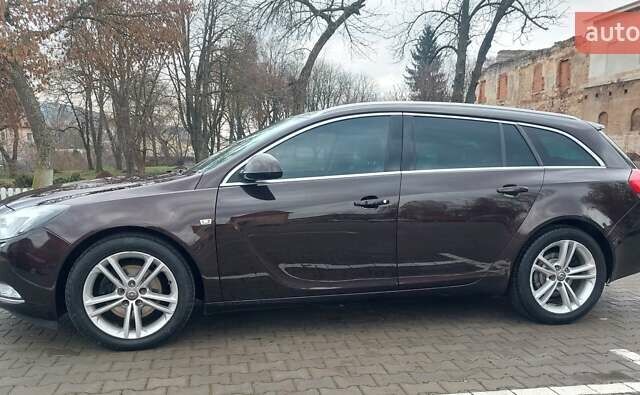 Коричневий Опель Інсігнія, об'ємом двигуна 1.96 л та пробігом 249 тис. км за 8500 $, фото 5 на Automoto.ua