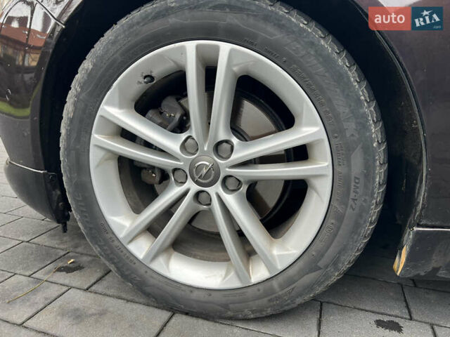 Коричневый Опель Инсигния, объемом двигателя 2 л и пробегом 252 тыс. км за 8900 $, фото 6 на Automoto.ua