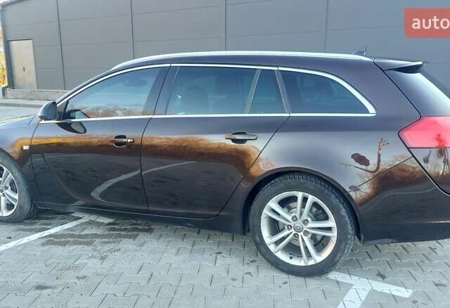 Коричневый Опель Инсигния, объемом двигателя 1.96 л и пробегом 249 тыс. км за 8850 $, фото 6 на Automoto.ua