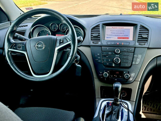 Коричневий Опель Інсігнія, об'ємом двигуна 1.96 л та пробігом 225 тис. км за 8700 $, фото 6 на Automoto.ua