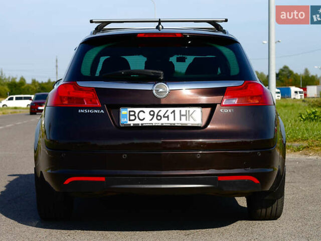 Коричневий Опель Інсігнія, об'ємом двигуна 1.96 л та пробігом 225 тис. км за 8700 $, фото 4 на Automoto.ua