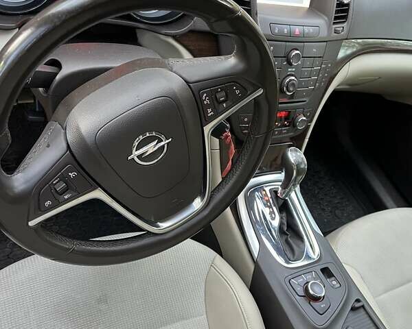 Коричневый Опель Инсигния, объемом двигателя 1.96 л и пробегом 235 тыс. км за 9500 $, фото 4 на Automoto.ua