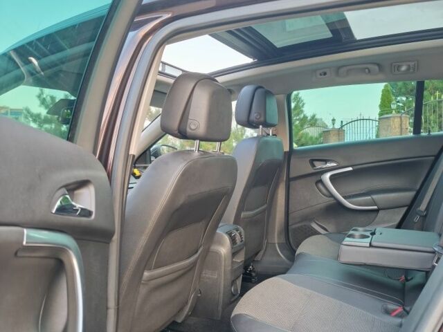 Коричневый Опель Инсигния, объемом двигателя 2 л и пробегом 250 тыс. км за 12000 $, фото 5 на Automoto.ua