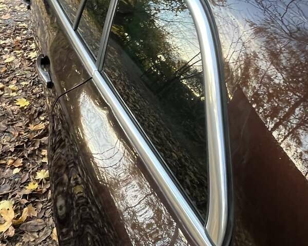 Коричневый Опель Инсигния, объемом двигателя 1.96 л и пробегом 235 тыс. км за 9500 $, фото 9 на Automoto.ua