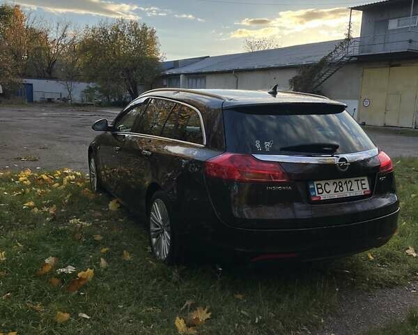 Коричневый Опель Инсигния, объемом двигателя 1.96 л и пробегом 235 тыс. км за 9500 $, фото 2 на Automoto.ua