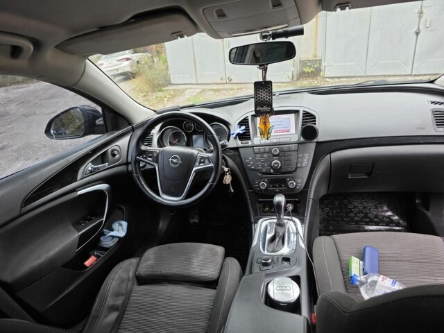 Коричневый Опель Инсигния, объемом двигателя 2 л и пробегом 236 тыс. км за 7600 $, фото 5 на Automoto.ua