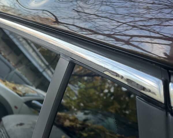 Коричневый Опель Инсигния, объемом двигателя 1.96 л и пробегом 235 тыс. км за 9500 $, фото 12 на Automoto.ua