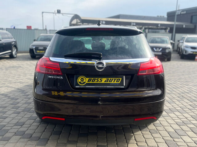 Коричневый Опель Инсигния, объемом двигателя 2 л и пробегом 246 тыс. км за 9600 $, фото 5 на Automoto.ua