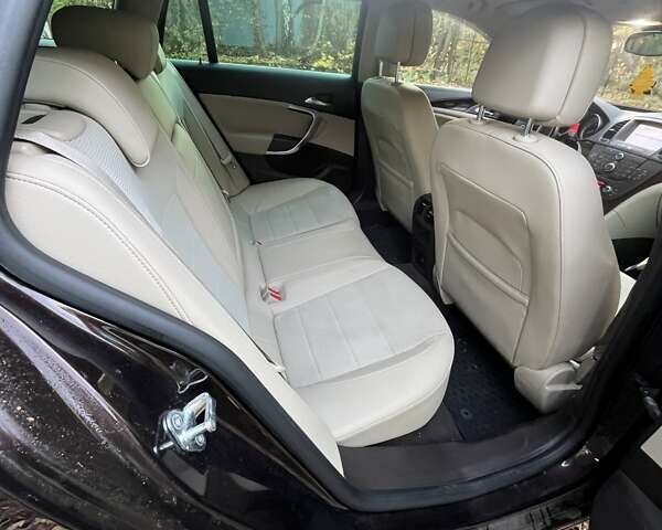 Коричневый Опель Инсигния, объемом двигателя 1.96 л и пробегом 235 тыс. км за 9500 $, фото 3 на Automoto.ua