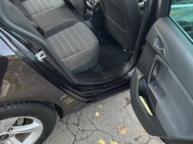 Коричневый Опель Инсигния, объемом двигателя 2 л и пробегом 218 тыс. км за 11300 $, фото 9 на Automoto.ua