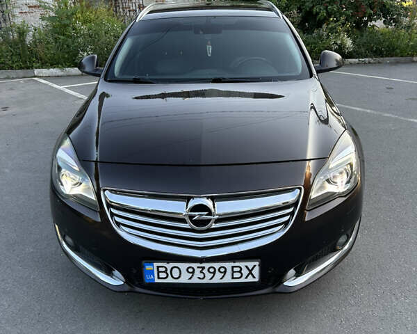 Коричневый Опель Инсигния, объемом двигателя 2 л и пробегом 260 тыс. км за 10850 $, фото 6 на Automoto.ua