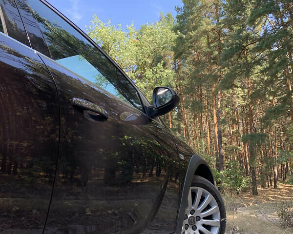 Коричневий Опель Інсігнія, об'ємом двигуна 1.96 л та пробігом 213 тис. км за 12200 $, фото 4 на Automoto.ua